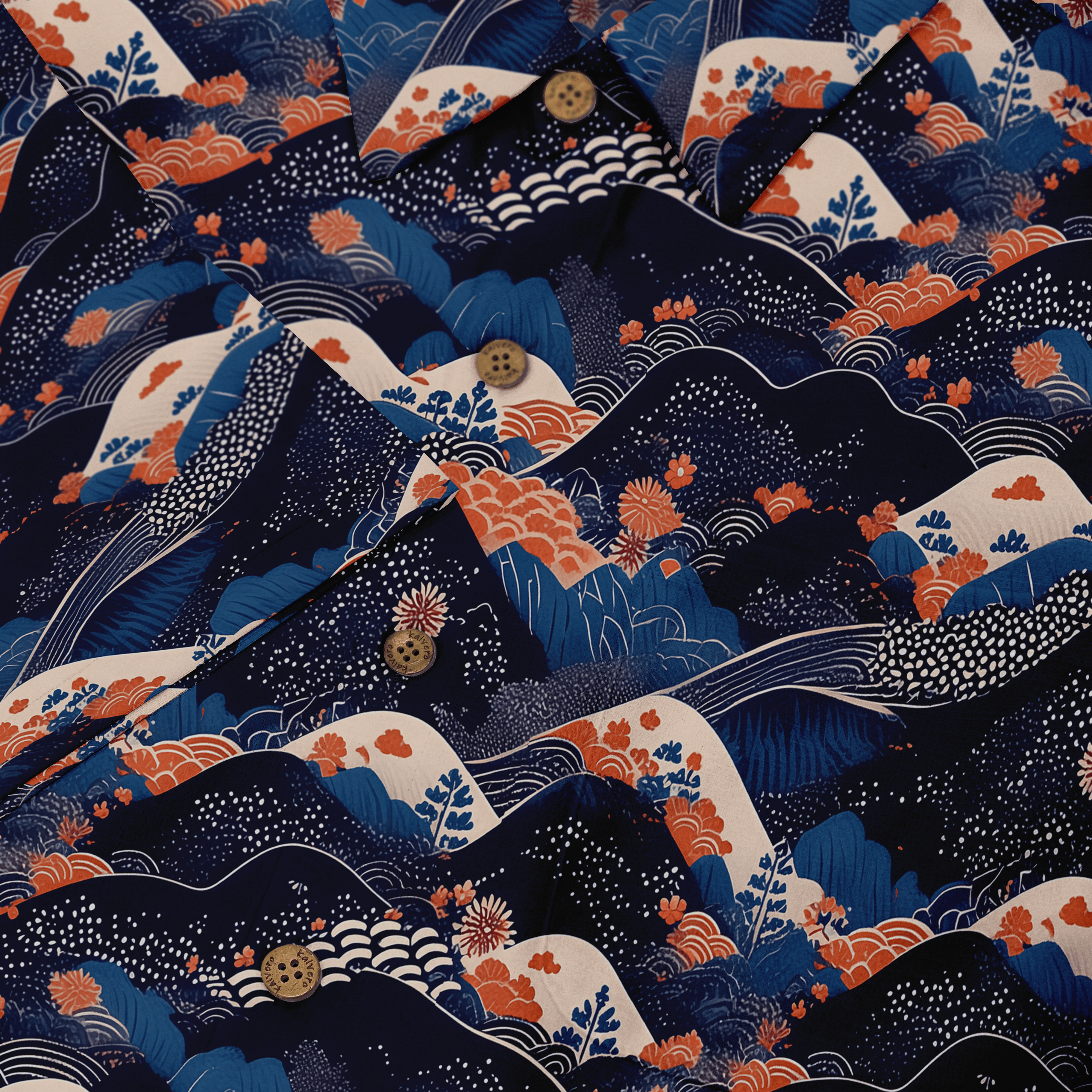 Dark blue fabric with orange waves, white dots, and floral patterns.